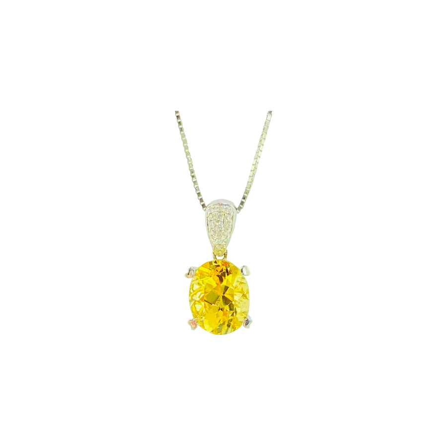 Oval Pendant with seventeen diamonds and heart shaped prongs
